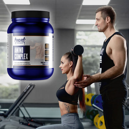 amino complex (450g) powder next to woman and man in gym, woman lifting weights