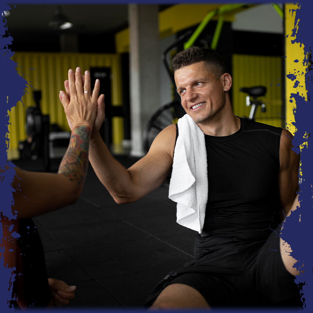 Pro-Fit Brand Ambassador celebrating teamwork with a high-five, symbolizing bonus achievements.