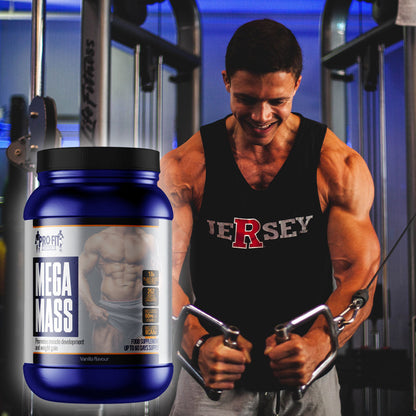 megamass (1800g) powder next to man working out in a gym