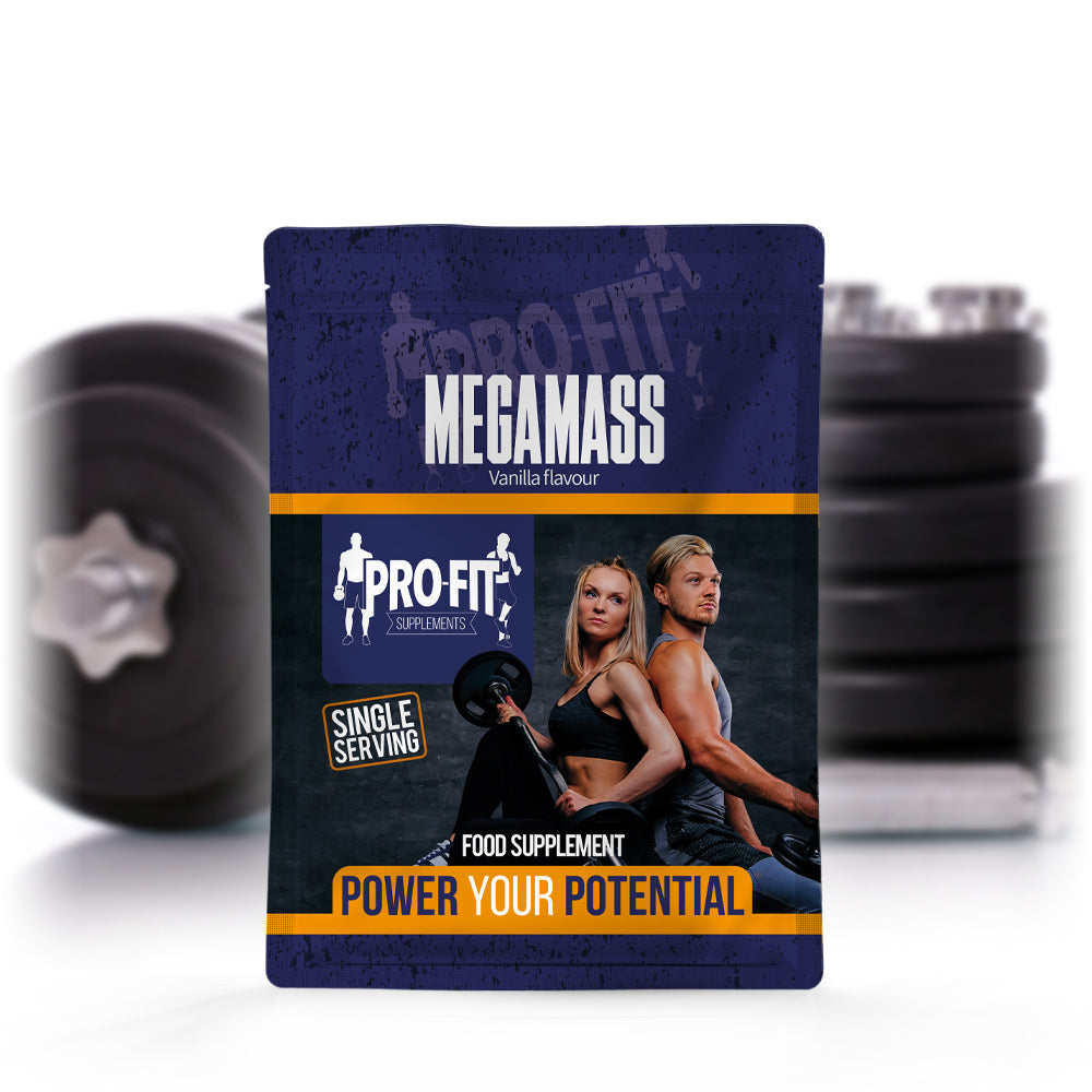 megamass single serving sachet in front of some weights