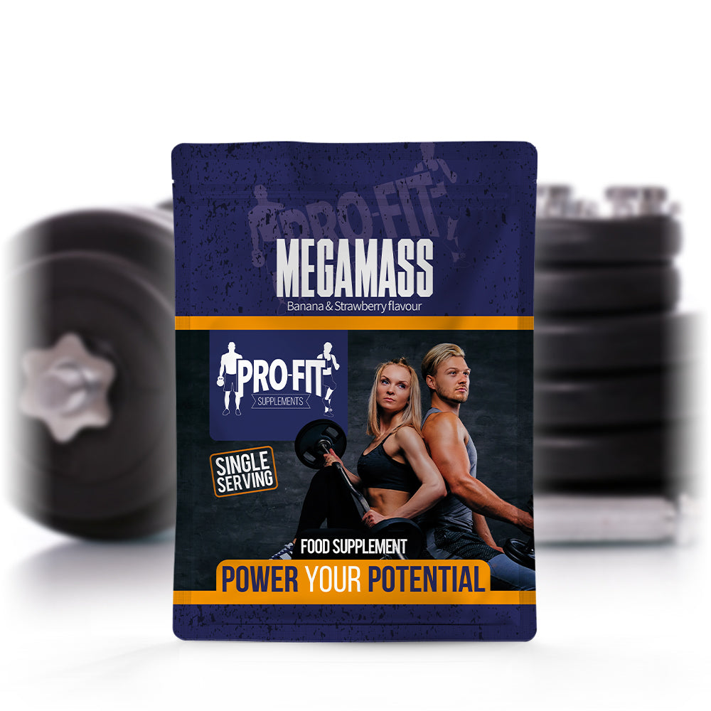 megamass powder single serving sachet in front of some weights