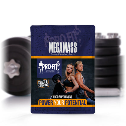 megamass powder single serving sachet in front of some weights