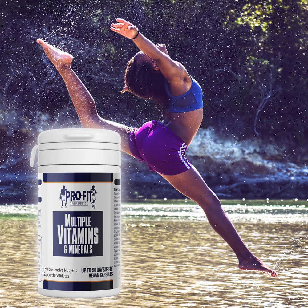multi vitamin & mineral next to woman leaping in front of a lake